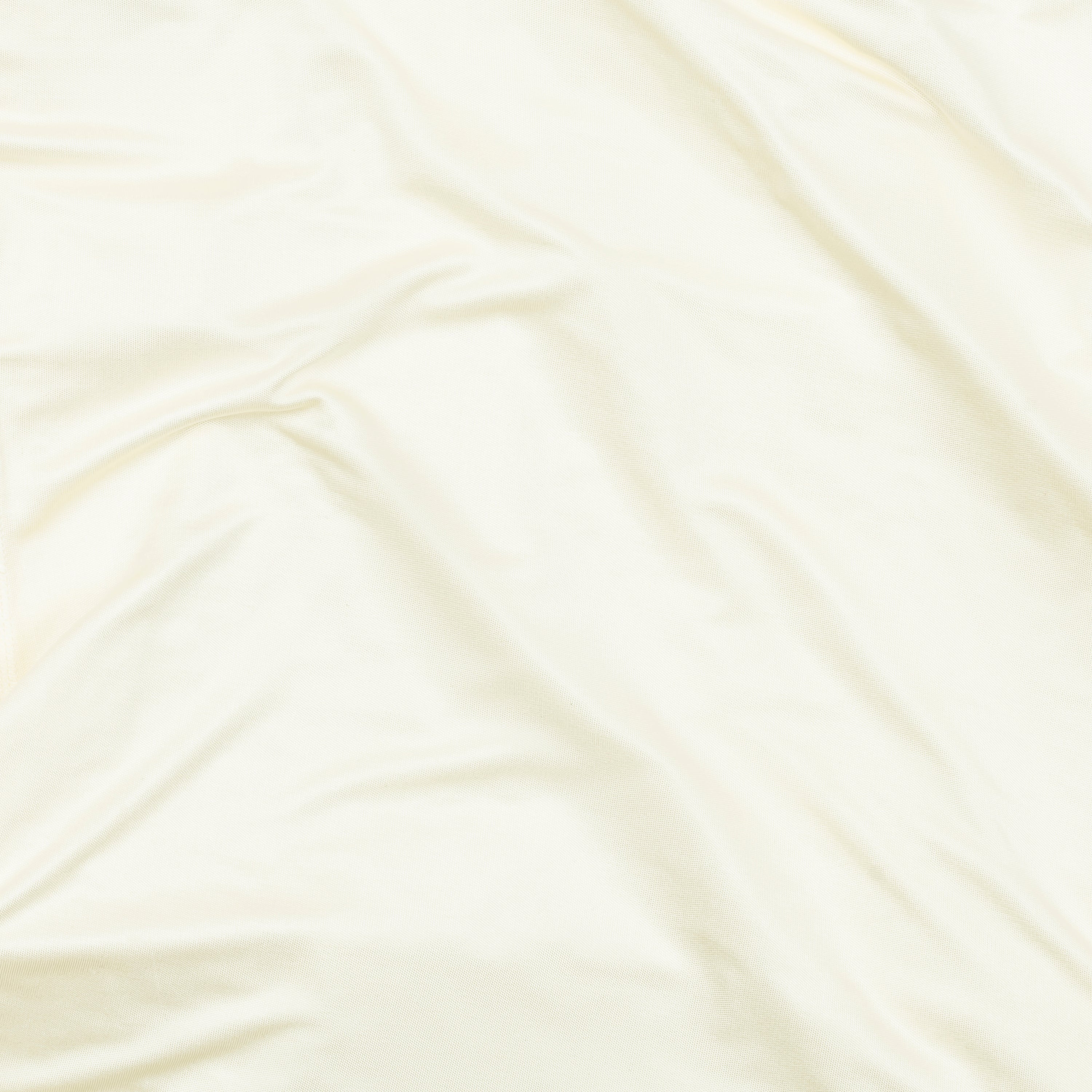 A long-sleeve Cream base layer T-shirt by Uwila Warrior, shown in against a white background.