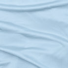 A long-sleeve Ice Blue base layer T-shirt by Uwila Warrior, shown against a white background.