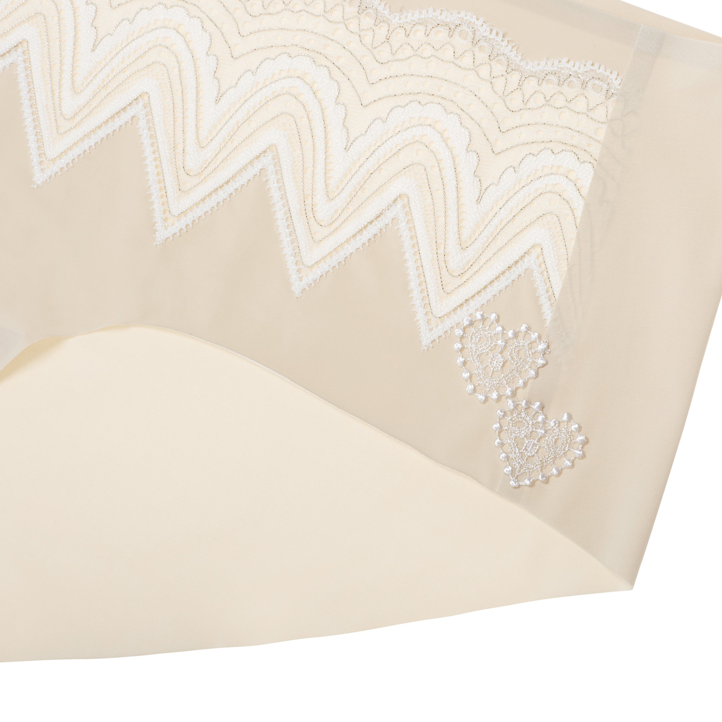A pair of smoke grey seamless bridal briefs with intricate lace detailing.
