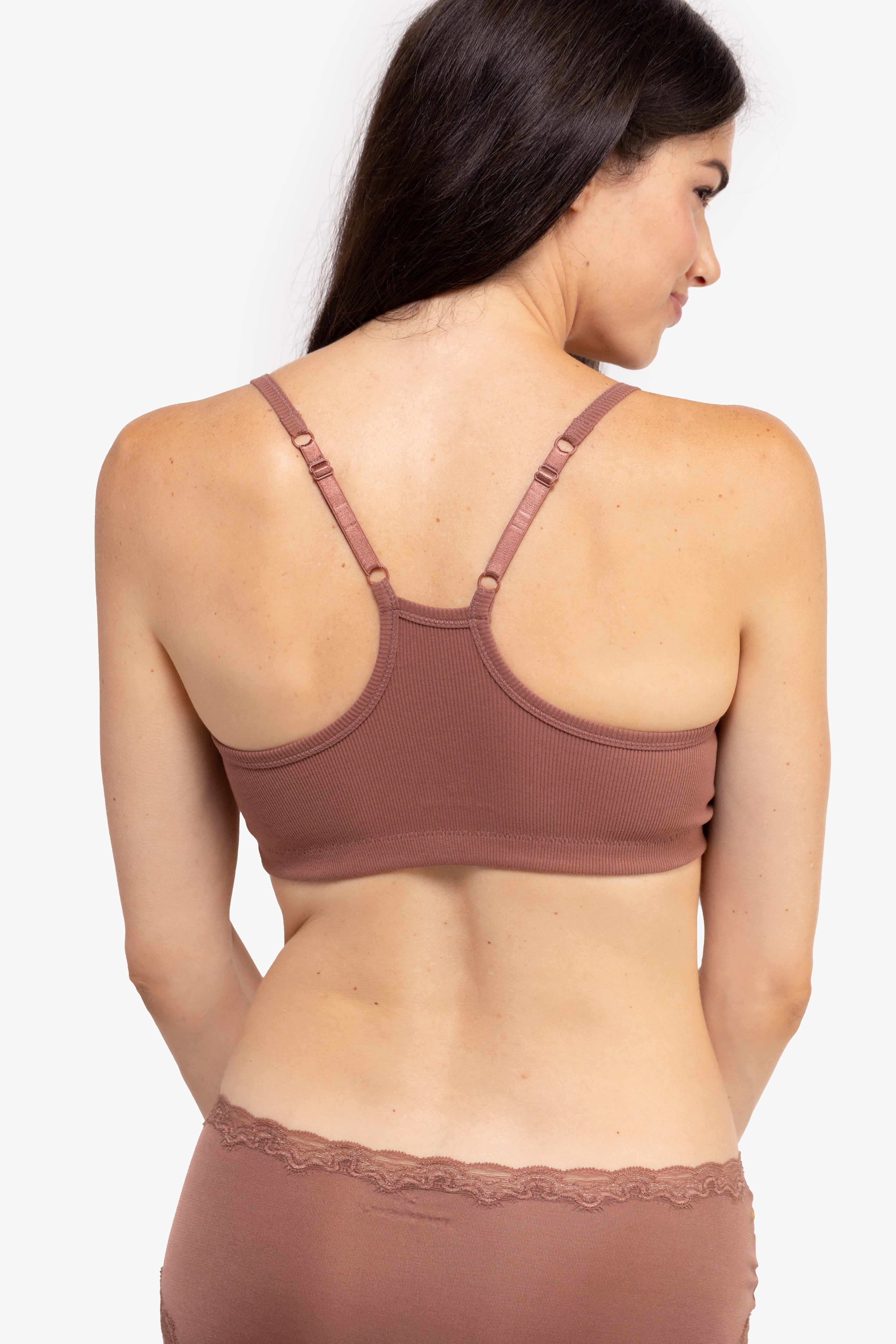 Model wearing a toffee bralette against a white background.