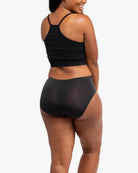 Model wearing the tap shoe black No-Brainer Brief against a white background