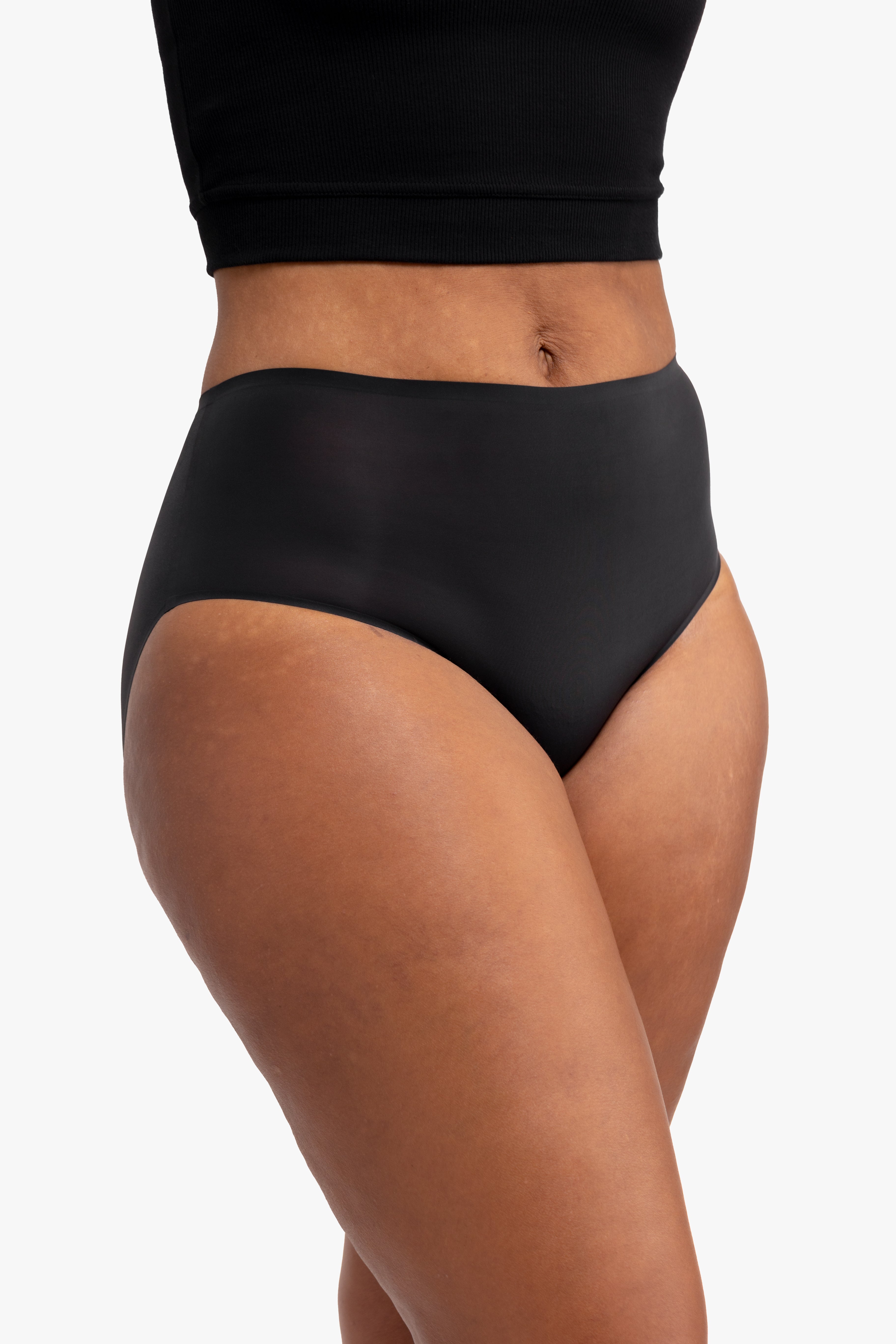 Model wearing the tap shoe black No-Brainer Brief against a white background