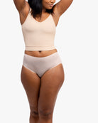 Model wearing the Almond No-Brainer Brief against a white background.