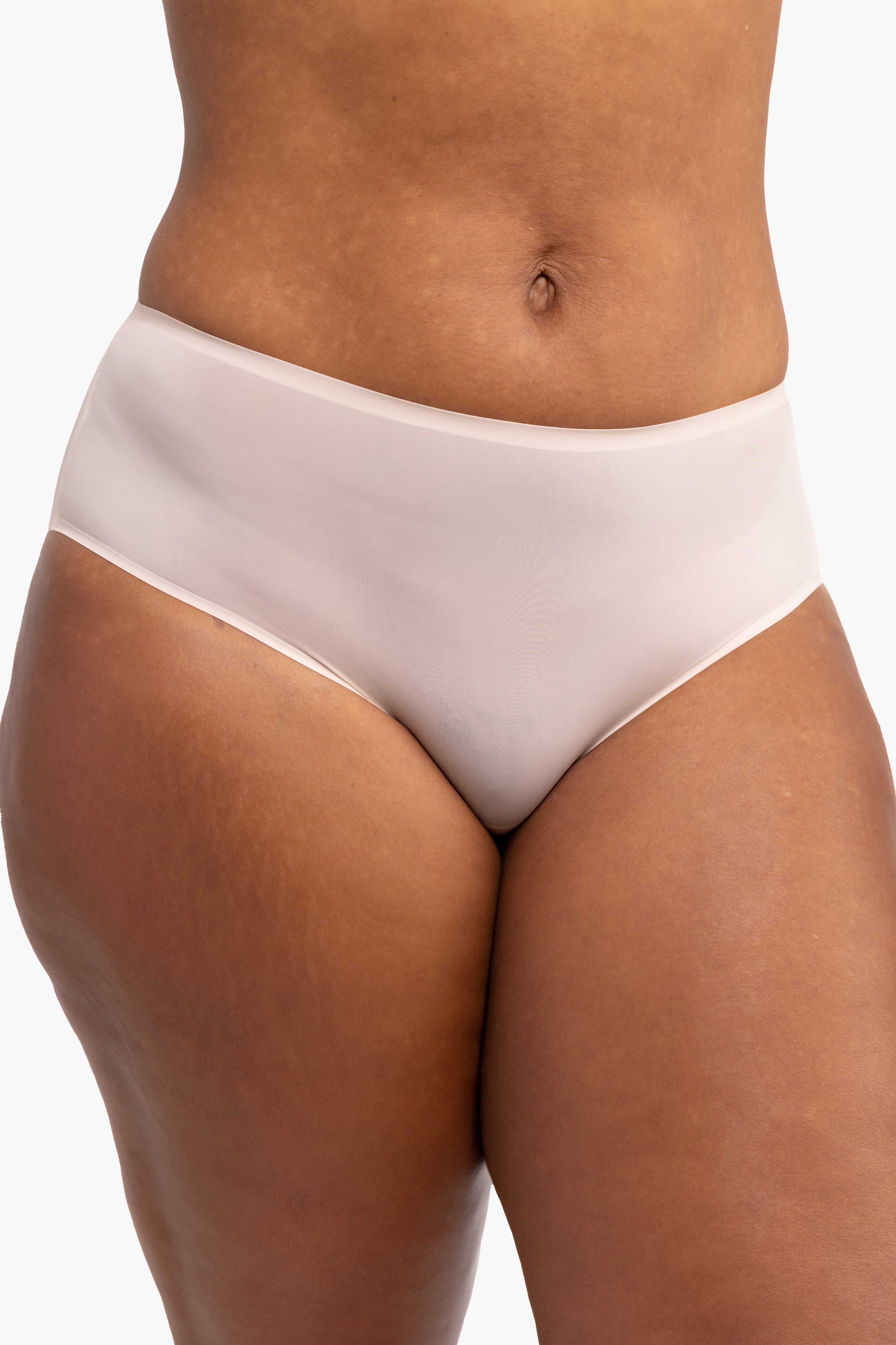 Model wearing the Almond No-Brainer Brief against a white background.